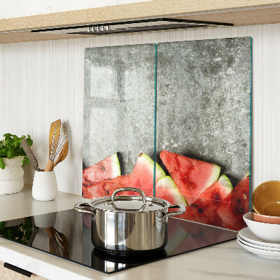 Glasschneidebrett Wassermelonenscheiben auf grauem Hintergrund