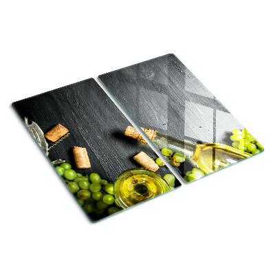 Schneidebrett glas Wein und Trauben