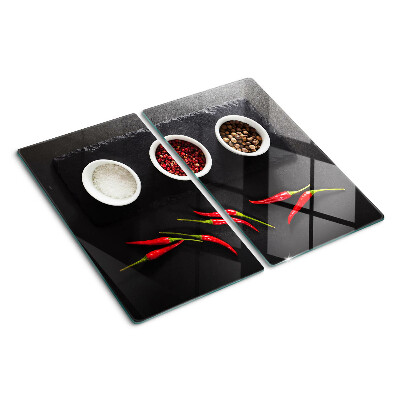 Schneidebrett glas Gewürze und rote Paprika