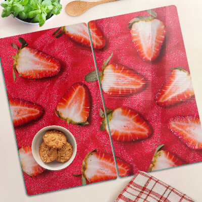 Schneidebrett glas Erdbeeren auf rosa Hintergrund