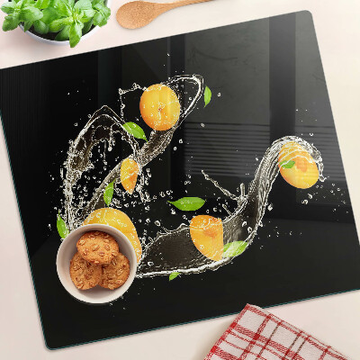 Glasschneidebrett Zitrusfrüchte im Wasser