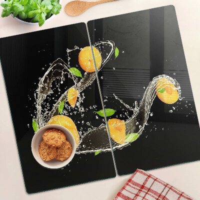 Glasschneidebrett Zitrusfrüchte im Wasser