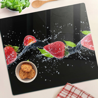 Schneidebrett glas Erdbeeren im Wasser