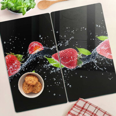 Schneidebrett glas Erdbeeren im Wasser