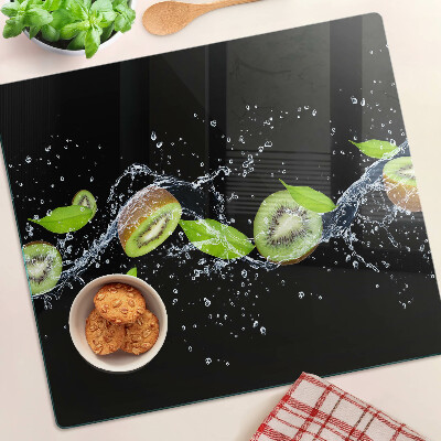 Schneidebrett glas Kiwi im Wasser mit Blättern
