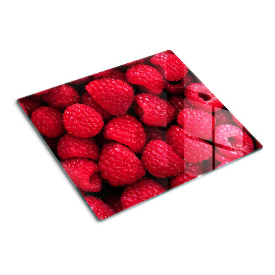 Schneidebrett glas Himbeeren auf dem Hintergrund