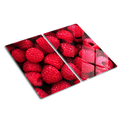 Schneidebrett glas Himbeeren auf dem Hintergrund
