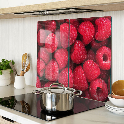 Schneidebrett glas Himbeeren auf dem Hintergrund