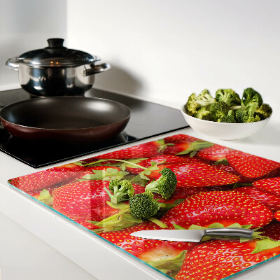 Glasschneidebrett Erdbeeren auf dem Hintergrund