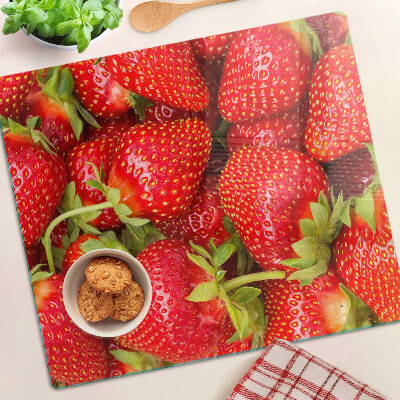 Glasschneidebrett Erdbeeren auf dem Hintergrund