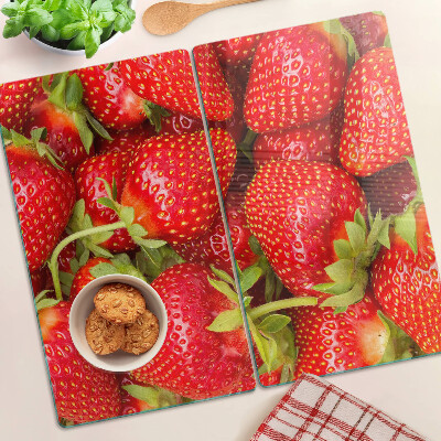 Glasschneidebrett Erdbeeren auf dem Hintergrund