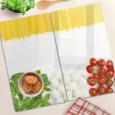 Schneidebrett glas Pasta mit Kräutern und Tomaten