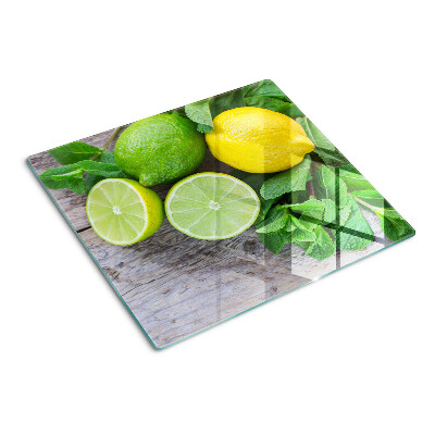 Schneidebrett glas Zitronen und Limetten mit Minze