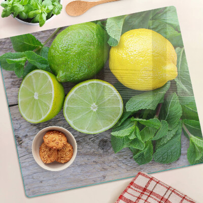 Schneidebrett glas Zitronen und Limetten mit Minze