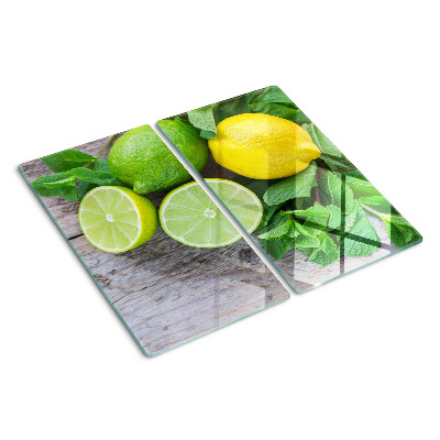 Schneidebrett glas Zitronen und Limetten mit Minze