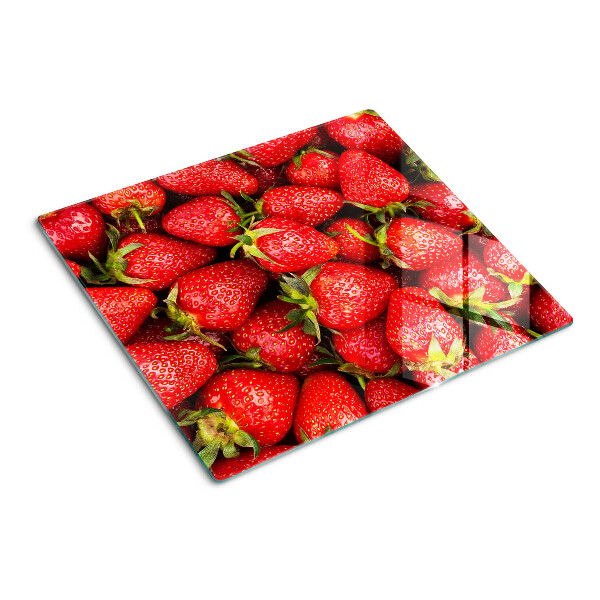 Schneidebrett glas Erdbeeren auf rotem Hintergrund