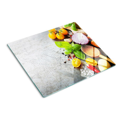 Schneidebrett glas Küchenzutaten und Kräuter