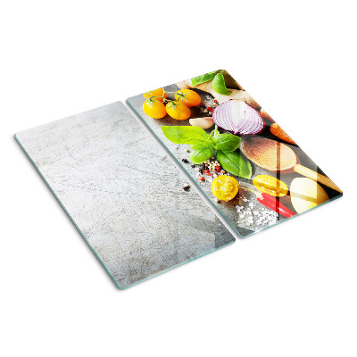 Schneidebrett glas Küchenzutaten und Kräuter