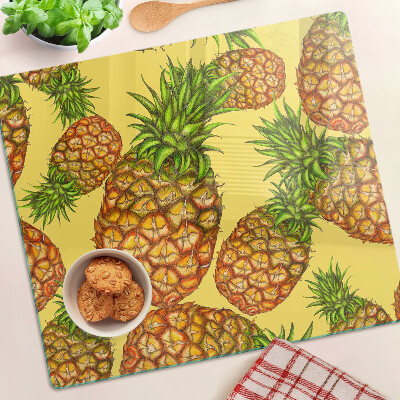 Glasschneidebrett Ananas auf gelbem Hintergrund
