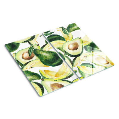 Glasschneidebrett Avocado auf einem Hintergrund aus Blättern