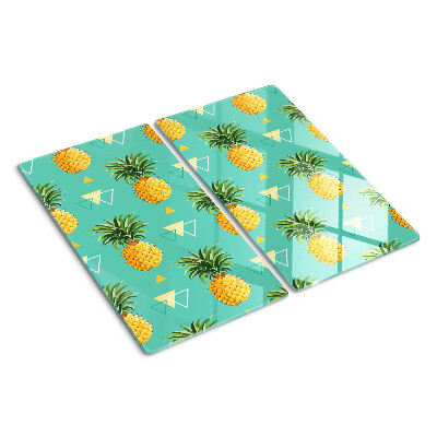 Schneidebrett glas Ananas auf türkisfarbenem Hintergrund