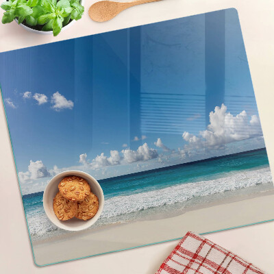 Glasschneidebrett Strand mit türkisfarbenem Wasser und Wolken
