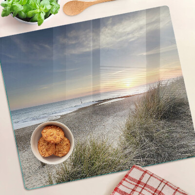 Schneidebrett glas Strand bei Sonnenuntergang