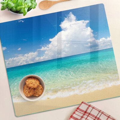Schneidebrett glas Strand mit türkisfarbenem Wasser und Wolken