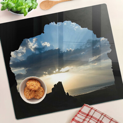 Glasschneidebrett Sonnenuntergang hinter den Wolken