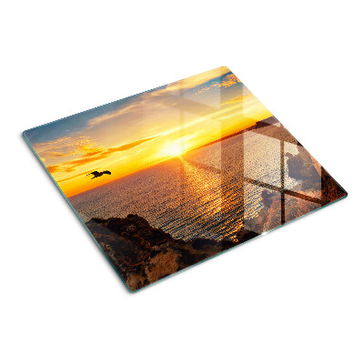 Glasschneidebrett Sonnenuntergang über dem Meer