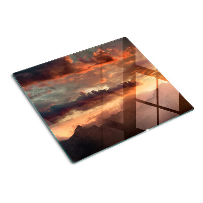 Glasschneidebrett Sonnenuntergang über den Bergen