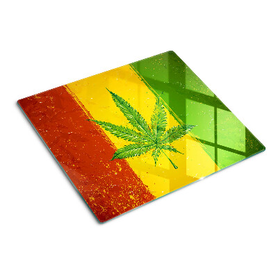 Glasschneidebrett Hanfblatt auf farbigem Hintergrund
