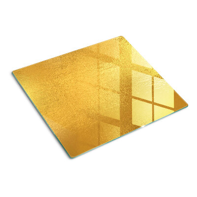 Schneidebrett glas Goldene Oberfläche mit Reflexionen