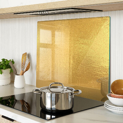 Schneidebrett glas Goldene Oberfläche mit Reflexionen