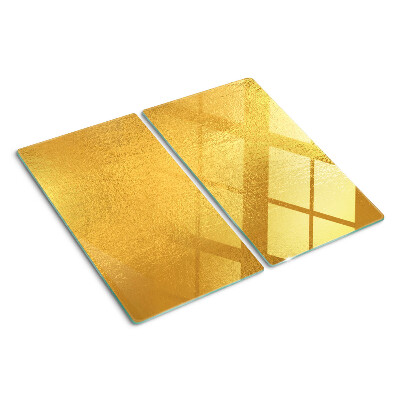Schneidebrett glas Goldene Oberfläche mit Reflexionen