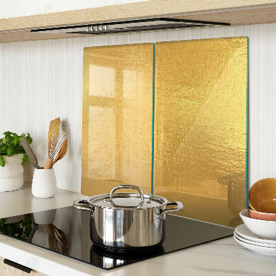 Schneidebrett glas Goldene Oberfläche mit Reflexionen