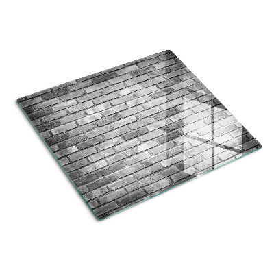 Glasschneidebrett Ziegelwand in Grautönen