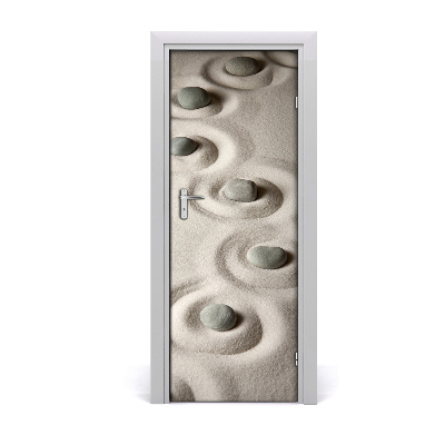 Selbstklebendes wandbild an der wand Steine auf sand