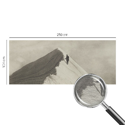 Dekorative Wand-Fototapete mit dem Motiv eines einsamen Bergsteigers