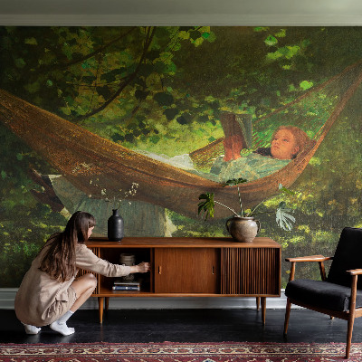 Vliestapete fürs Schlafzimmer mit Motiv einer entspannten Person in einer Hängematte