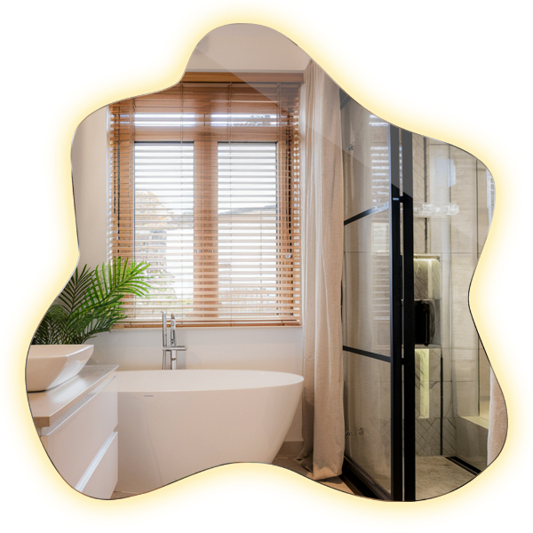 Spiegel in Klecksform LED-beleuchteter