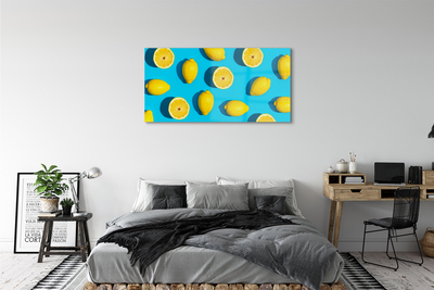 Acrylglasbilder Zitronen auf einem blauen hintergrund