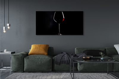 Leinwandbilder schwarzer Hintergrund mit einem Glas Wein