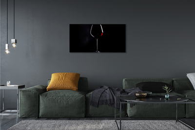 Leinwandbilder schwarzer Hintergrund mit einem Glas Wein