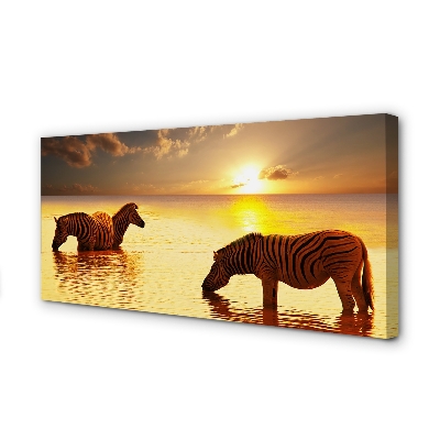 Leinwandbilder Sonnenuntergang Wasser Zebras