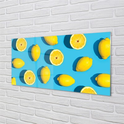 Glasbilder Zitronen auf einem blauen hintergrund