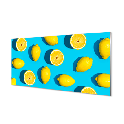 Glasbilder Zitronen auf einem blauen hintergrund