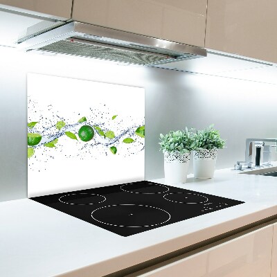 Glas Herdabdeckplatte Limetten und Wasser