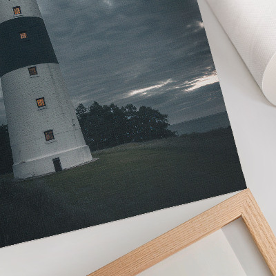 Kunstdruck leinwand Ein Leuchtturm vor einem bewölkten Himmel