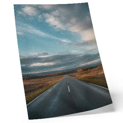 Kunstdruck auf Leinwand eine herbstliche Landschaft mit einer Straße unter blauem Himmel